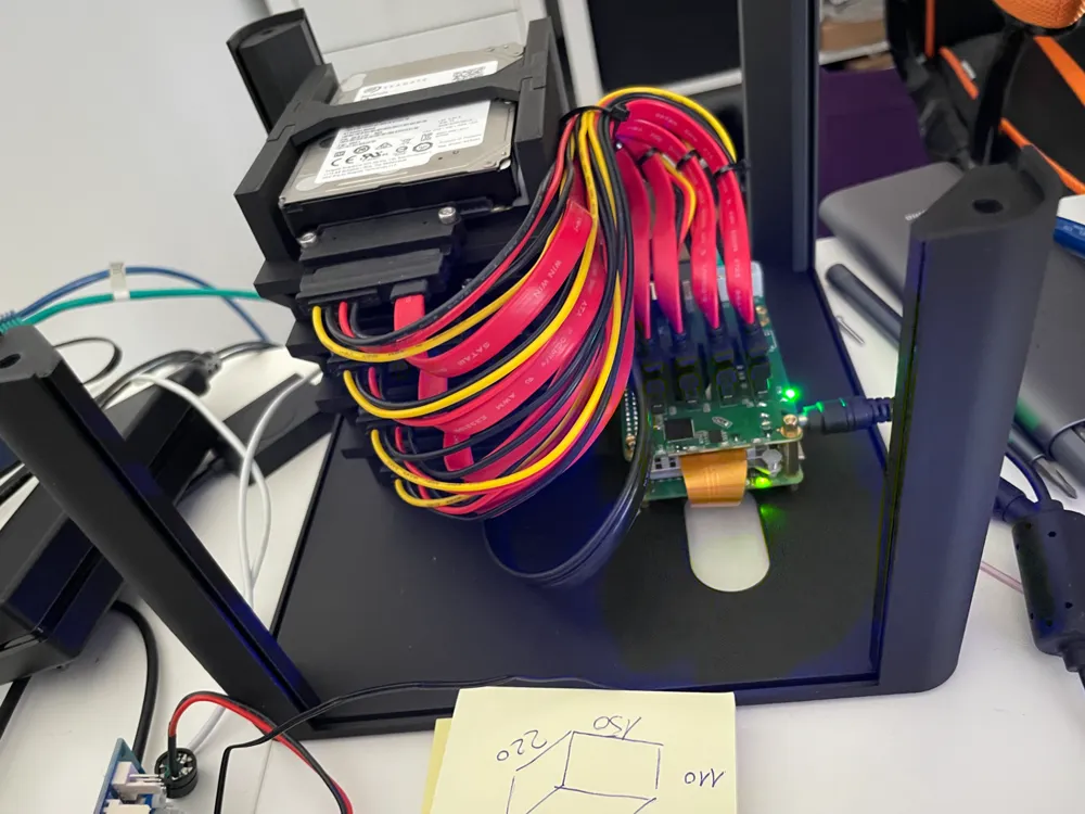 Five 2.5-inch drives connected to the Radxa Penta SATA HAT with routed SATA data and power cables