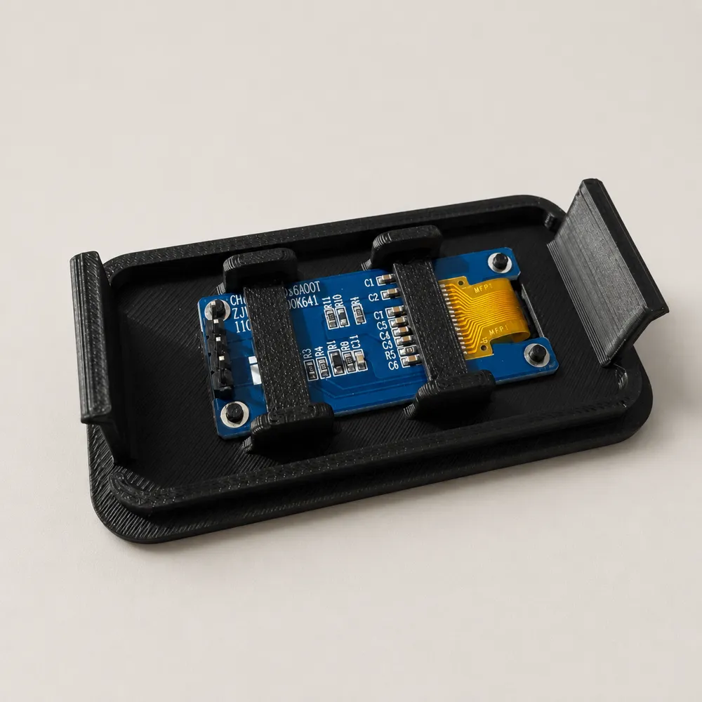 Rear of the HA Proxy Panel front panel showing the OLED secured by printed retaining clips